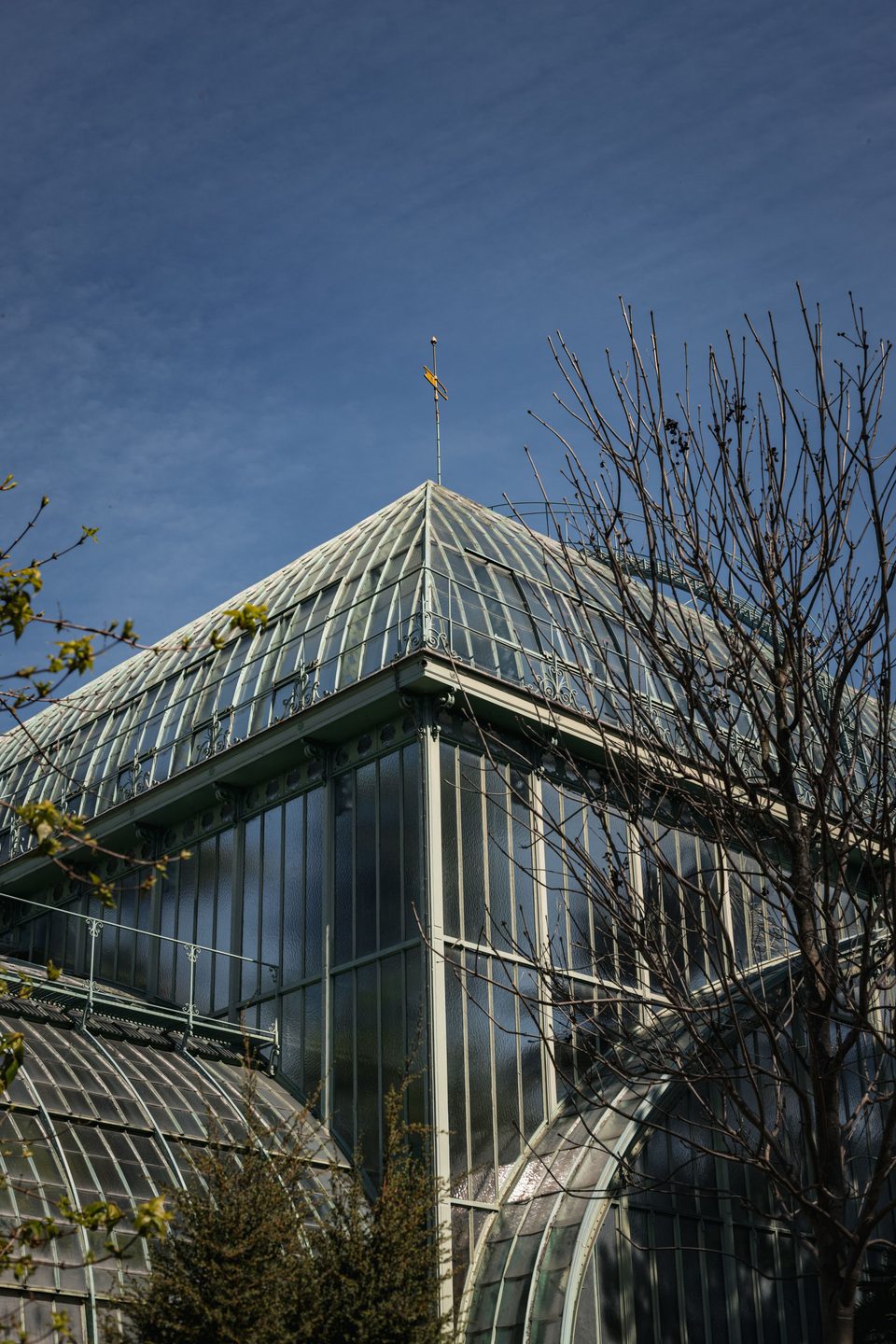 Glass greenhouse exterior. Style example, not an Arc Signage Co project.