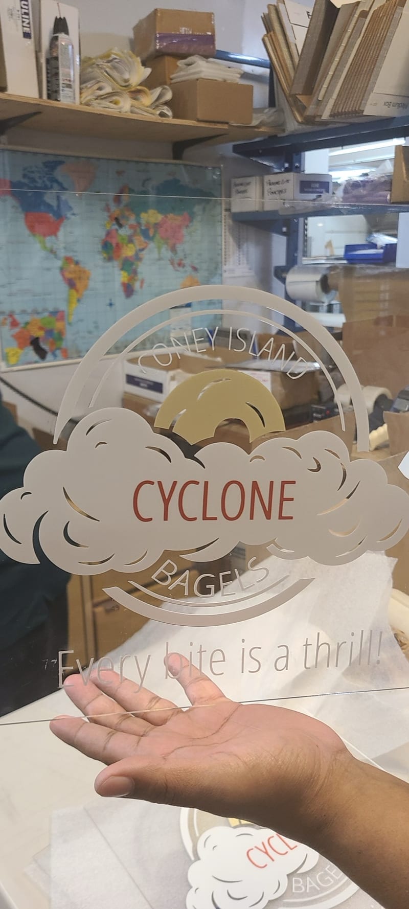 Cyclone Bagels window graphic.