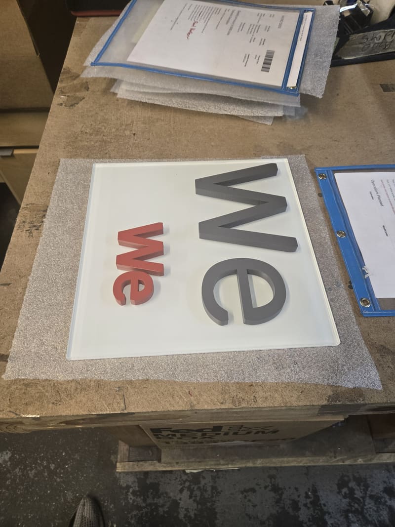 Dimensional letters in a color prototype layout.